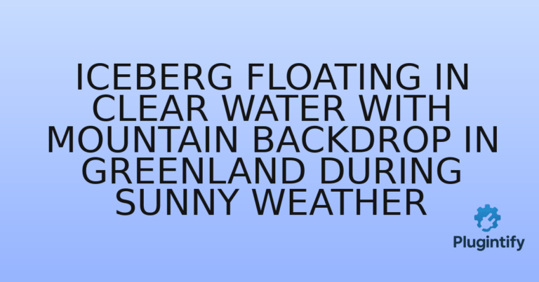 Read more about the article Iceberg floating in clear water with mountain backdrop in Greenland during sunny weather